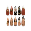 Designer nail set edited without its case on a white background