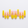 Pink-and-yellow floral nail photo edit